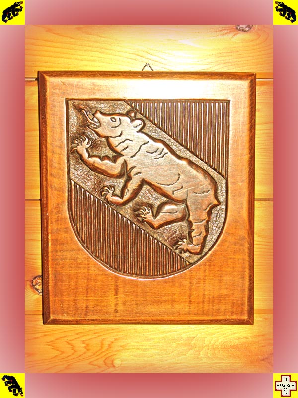Photo: Bern Bear on carved wooden plaque.
