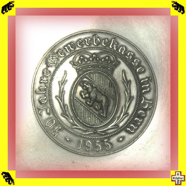 Photo: Bern Bear on pewter (Zinn) plate from 1955 Bern trade show (Gewerbekasse in Bern).