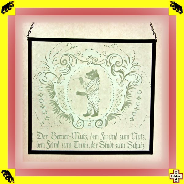 Photo: Bern Bear on etched glass with Swiss German rhyme 'Der Berner-Mutz, dem Freund zum Nutz, dem Feind zum Trutz, der Stadt zum Schutz.', which means 'The Bern Bear, the friend of those in need, enemy of (evildoers), the city that protects.'