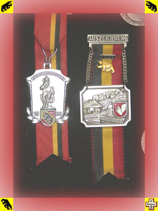 Photo: Bern Bear on shooting medals.