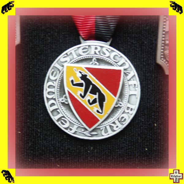 Photo: Bern Bear on shooting medal.